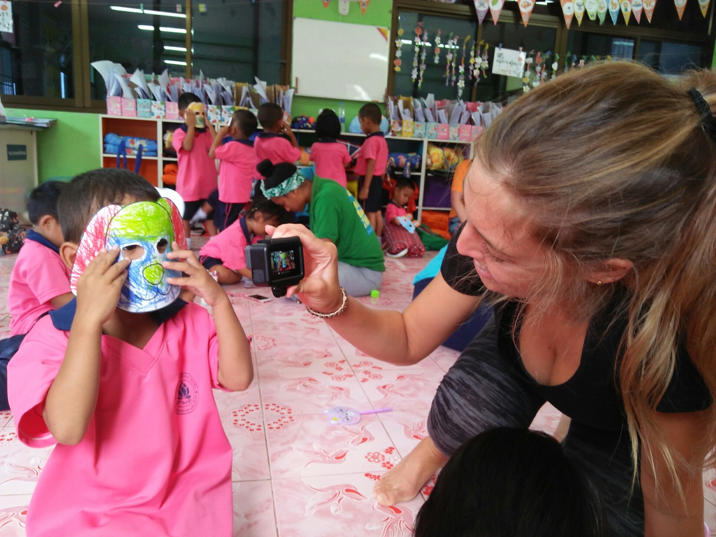 Participant taking photo the student