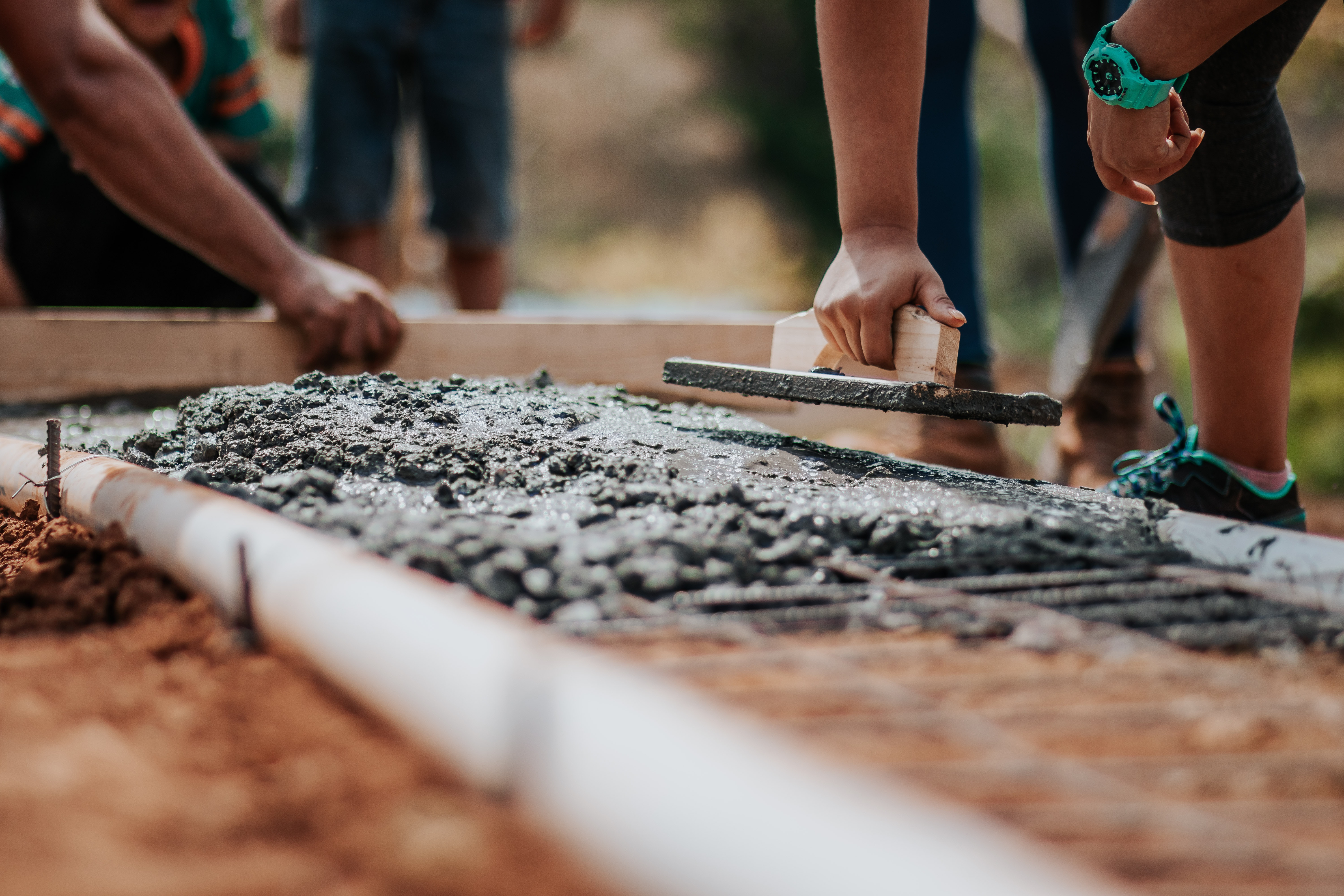 Participants working on flooring