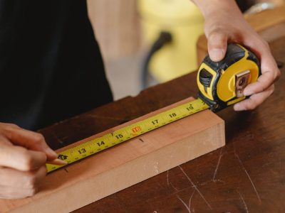 Participant measuring wood fittings