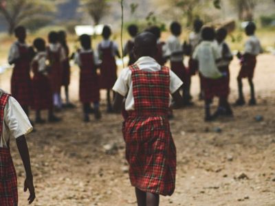 Student rushing to plant her seedling